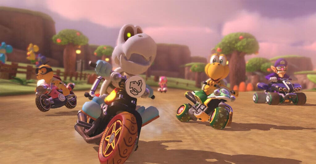 Corrida de Mario Kart 8 Deluxe, que é um jogo multiplayer local e online
